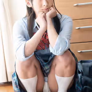 Squirting Girl in School Uniform and Bloomers